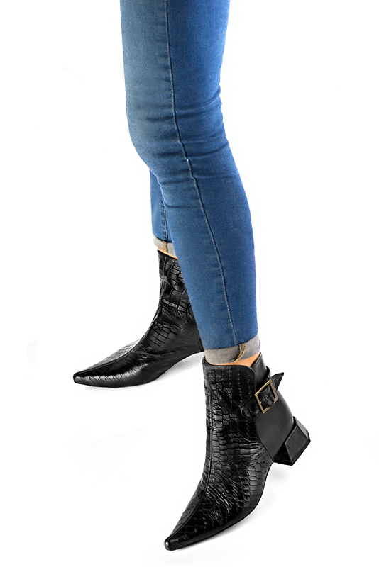 Satin black women's ankle boots with buckles at the back. Pointed toe. Low flare heels. Worn view - Florence KOOIJMAN